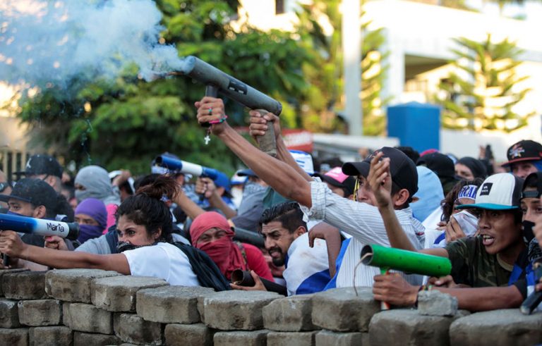 Demonstrators fire a homemade mortar during a protest against Nicaragua's President Daniel Ortega's government in Managua