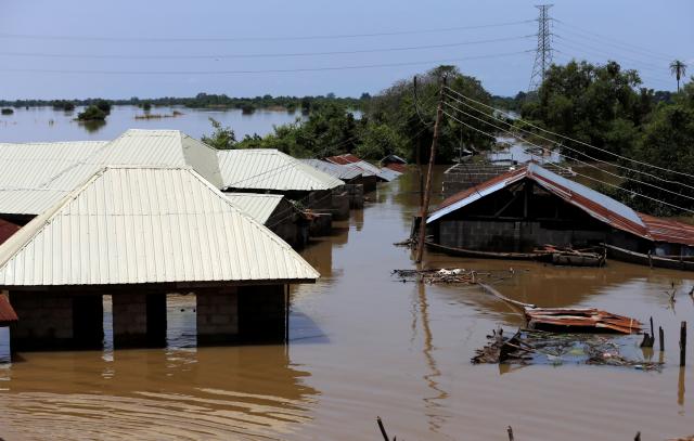 Houses partially submerged in flood waters are pictured  in Lokoja city