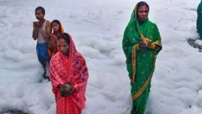 Devotees Stand In Knee-Deep in Toxic Foam In Delhi’s Yamuna River Pics Go Viral